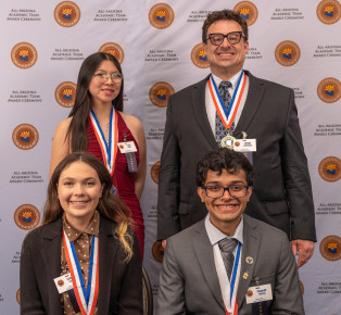 2026 MCC All-Arizona honorees Lena Nape, David Robinson, Toni-Ann Gardner and Pranay Modha wearing their All-Arizona medallions. 