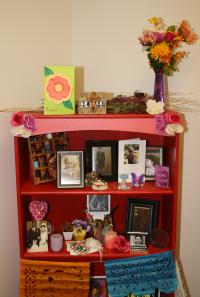 Colorful Altar with Flowers and Pictures
