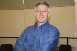 Man in blue shirt
