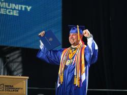 College graduate in gown and cap