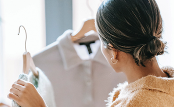 woman looking at clothes