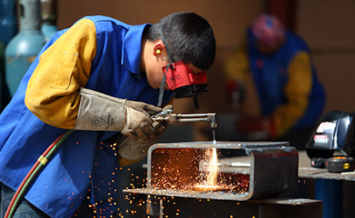 person welding