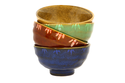 four colorful bowls stacked on top of each other