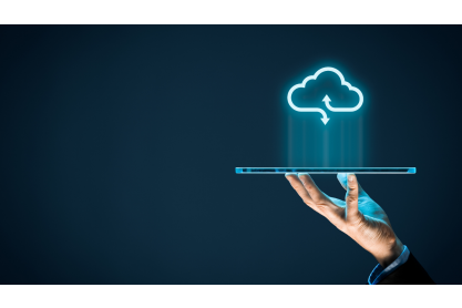 Side view of a man's hand holding a tablet with a glowing symbol of a cloud above