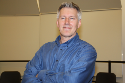 Man in blue shirt