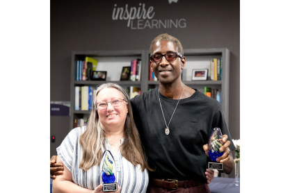 MCC 2022 Outstanding Adjunct Faculty: Dawn and Rod holding small clear egg shaped awards which have yellow and blue colored ribbons in the center. 