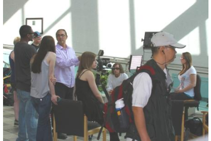 Eddie Webb on set with students