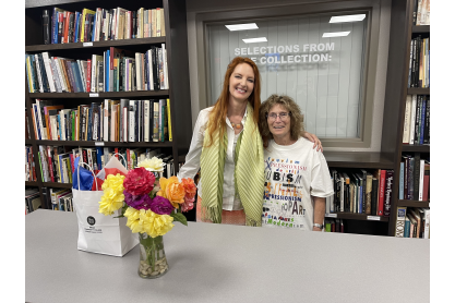 MCC Art Department Chair Gingher Leyendecker and Dr. Carole Drachler in the Art History Library at MCC. 