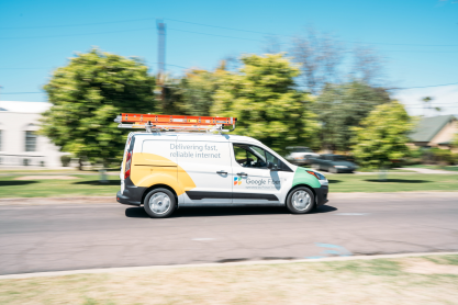photo of work van driving