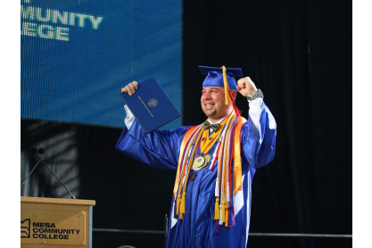 College graduate in gown and cap