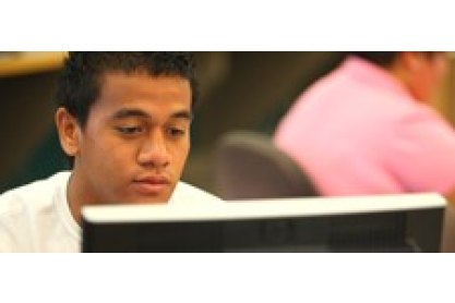 Male student with laptop