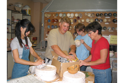 Packaging bowls to transport to the Empty Bowls event
