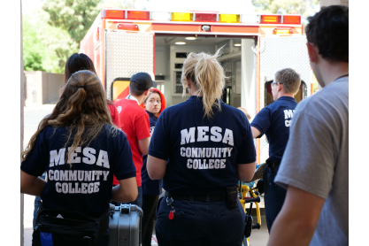 2018 ITPME participants near an ambulance. 