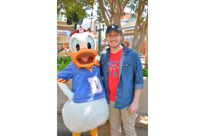 Shane Siebold with Donald Duck during internship. 