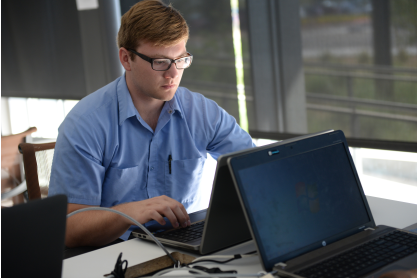 Man at laptop computer. 