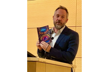 Todd Alan Fredson, Ph.D., Mesa Community College English faculty,with his book Zakwato & Loglêdou’s Peril