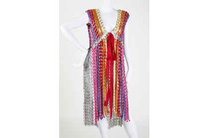 Prior fashion design, wearable art can tab, vest front dress.