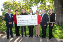 Seven individuals holding a very large replica of a check for $40,000 from TruWest Credit Union made out to MCC. Individuals are, left to right: Christos Chronis, Marcy Snitzer, Dr. Lori Berquam from MCC; Alan Althouse, President/CEO, TruWest Credit Union, Melissa Carpenter, MCC; Gary Bernard, Executive Vice President &amp; COO and Jennifer Kimmell, Senior Vice President &amp; CMOTruWest Credit Union. 