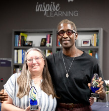 MCC 2022 Outstanding Adjunct Faculty: Dawn and Rod holding small clear egg shaped awards which have yellow and blue colored ribbons in the center. 