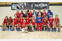 Women's Basketball team with trophy.