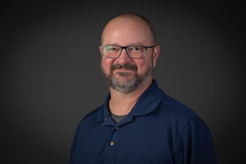 Headshot of James Harrison.
