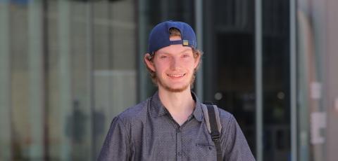 Male student looking at the camera