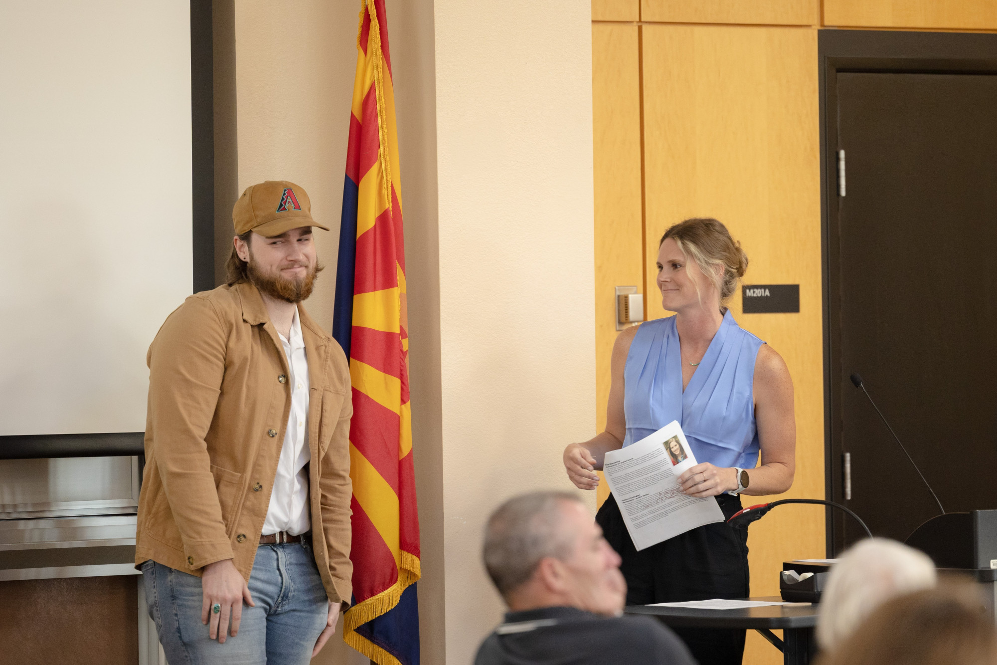 A student being presented with a Summit Award