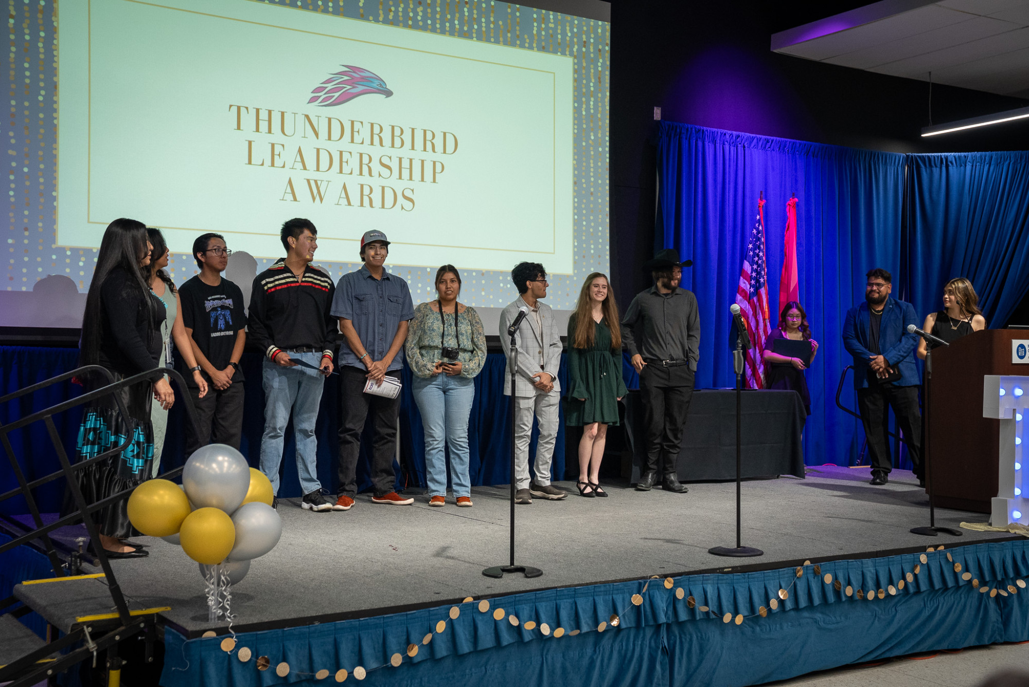 Students on stage receiving their award
