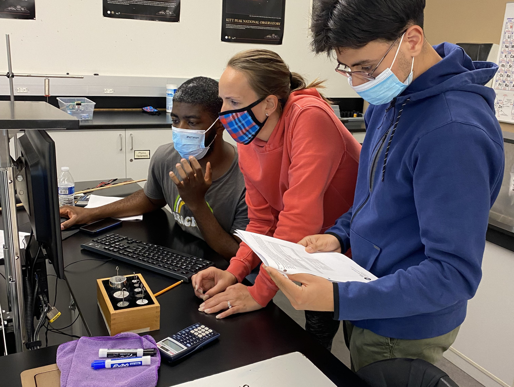 Instructor and students collaborating