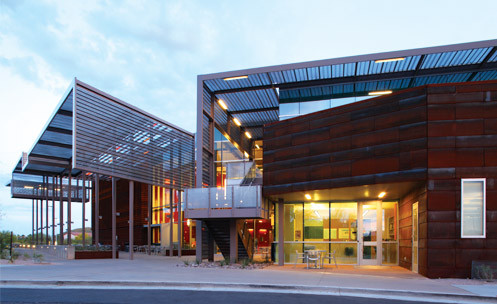 The exterior of a building with awnings overhead.