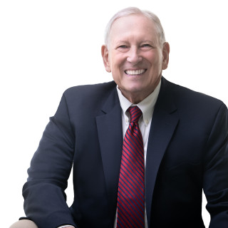 Anthony Occhiuzzi wearing a black jacket, white shirt and tie
