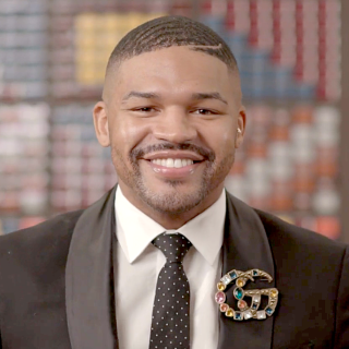 Headshot of Dion Brooks.